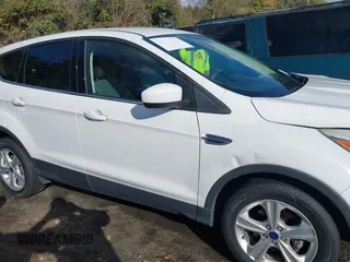 2014 Ford Escape SE with VIN 1FMCU0GX0EUE35004, listed as a IAAI auction lot 40811631 with 126,464 mi miles. Bid and sale history available at carsss.com. Image 13.