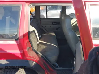 1996 Jeep Cherokee SE with VIN 1J4FT28S0TL225891, listed as a IAAI auction lot 41411705 with 233,983 mi miles and . Bid and sale history available at DreamBid. Image 8.