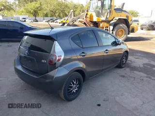 2013 Toyota Prius One with VIN JTDKDTB39D1536905, listed as a IAAI auction lot 41962613 with 212,078 mi miles and . Bid and sale history available at DreamBid. Image 4.
