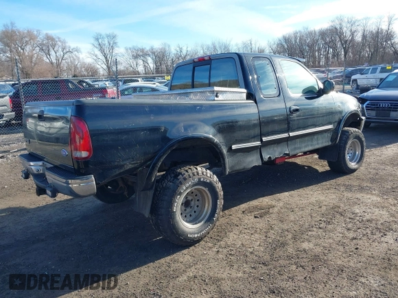 1997 Ford F-150 XL with VIN 1FTDX18W7VKC26527, listed as a IAAI auction lot 41692112 with 187,720 mi miles. Bid and sale history available at carsss.com. Image 4.