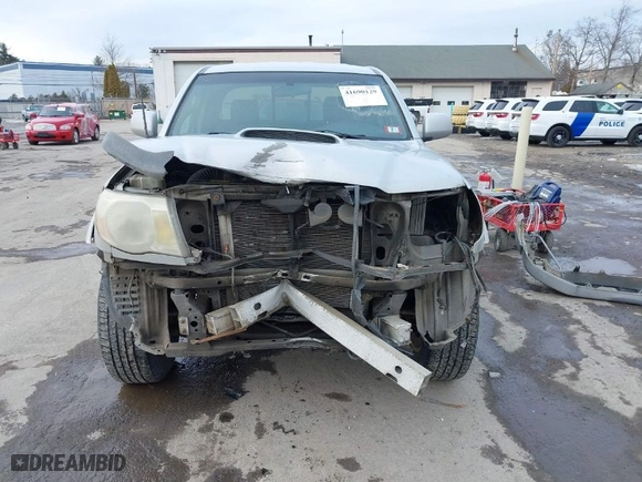 2005 Toyota Tacoma with VIN 5TEUU42N85Z043059, listed as a IAAI auction lot 41690129 with 129,927 mi miles. Bid and sale history available at carsss.com. Image 6.