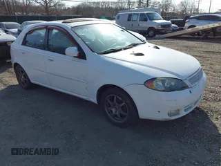 2005 Suzuki Reno z VIN KL5JJ66Z95K107110, wystawiony jako IAAI lot #41804157 z przebiegiem Nie podano mil oraz . Historia ofert i sprzedaży dostępna na DreamBid. Obrazek 1.