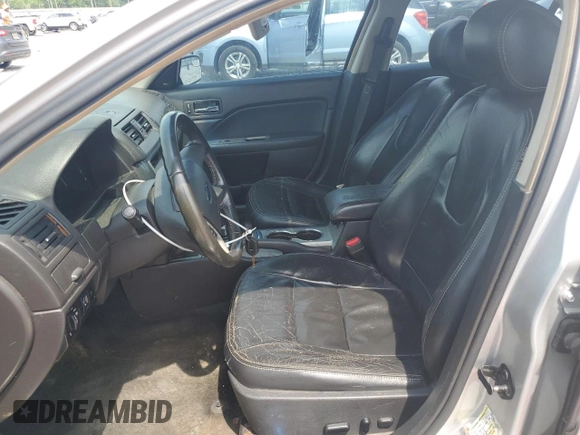 2012 Ford Fusion SEL with VIN 3FAHP0JG9CR202680, listed as a Copart auction lot 57423305 with 199,168 mi miles and Salvage title. Bid and sale history available at DreamBid. Image 7.