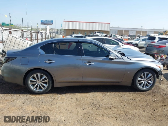 2015 Infiniti Q50 z VIN JN1BV7AP6FM335914, wystawiony jako IAAI lot #42065648 z przebiegiem 192 986 mil mil oraz . Historia ofert i sprzedaży dostępna na DreamBid. Obrazek 14.
