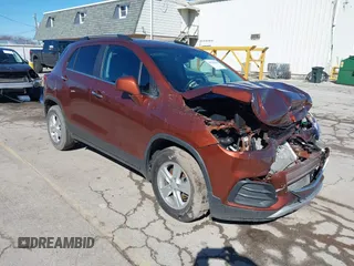 2019 Chevrolet Trax LT z VIN 3GNCJLSB9KL279780, wystawiony jako IAAI lot #41732616 z przebiegiem 61 196 mil mil oraz . Historia ofert i sprzedaży dostępna na DreamBid. Obrazek 1.