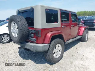 2007 Jeep Wrangler Unlimited Sahara with VIN 1J4GA59187L116585, listed as a IAAI auction lot 41996297 with 151,961 mi miles and . Bid and sale history available at DreamBid. Image 4.
