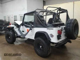 1990 Jeep Wrangler S with VIN 2J4FY19E8LJ541713, listed as a Copart auction lot 60809655 with 134,077 mi miles and Clean title. Bid and sale history available at DreamBid. Image 2.