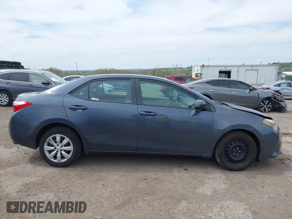 2015 Toyota Corolla L with VIN 2T1BURHE1FC381115, listed as a IAAI auction lot 42088980 with 203,493 mi miles and . Bid and sale history available at DreamBid. Image 12.