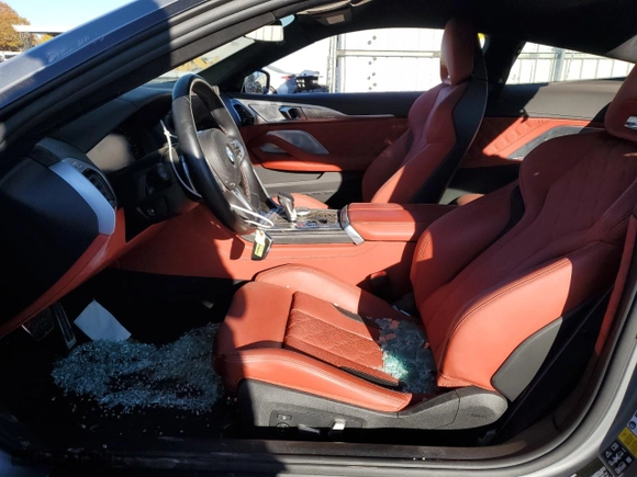 2023 BMW M8 Competition with VIN WBSAE0C09PCM48868, listed as a Copart auction lot 77753414 with 0 mi miles and Salvage Title. Bid and sale history available at carsss.com. Image 7.