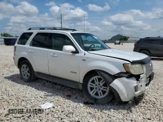 2008 Mercury Mariner Premier z VIN 4M2CU87128KJ53679, wystawiony jako Copart lot #54269815 z przebiegiem Nie podano mil oraz Szkody całkowita. Historia ofert i sprzedaży dostępna na DreamBid. Obrazek 4.