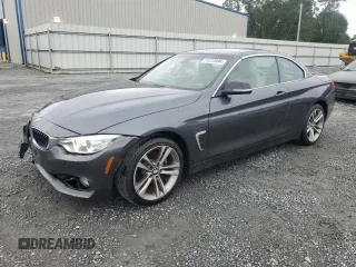 2014 BMW 4 Series 428i xDrive with VIN WBA3T1C58EPS98164, listed as a Copart auction lot 71273804 with 53,836 mi miles and Salvage Title. Bid and sale history available at carsss.com. Image 1.