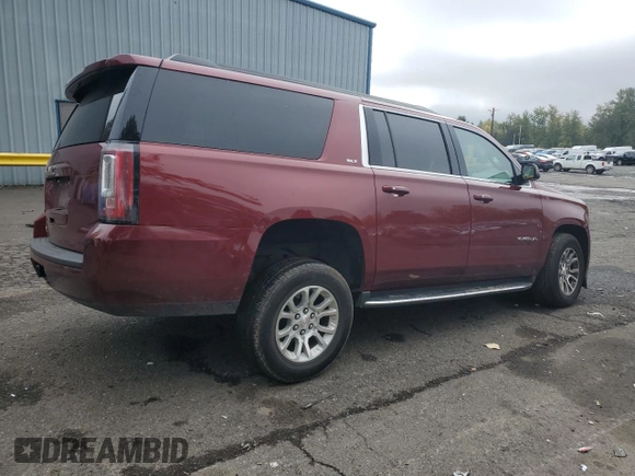 2019 GMC Yukon XL SLT with VIN 1GKS2GKC6KR341781, listed as a Copart auction lot 77468734 with 93,482 mi miles and Salvage Title. Bid and sale history available at DreamBid. Image 3.