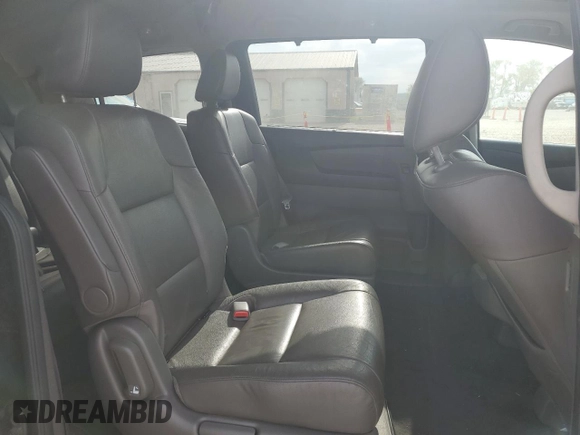 2014 Honda Odyssey Touring z VIN 5FNRL5H94EB006827, wystawiony jako Copart lot #55859715 z przebiegiem 195 131 mil mil oraz Szkoda całkowita • Salvage title. Historia ofert i sprzedaży dostępna na DreamBid. Obrazek 10.