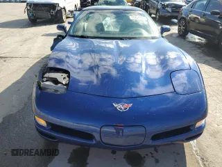 2004 Chevrolet Corvette with VIN 1G1YY22G145132963, listed as a Copart auction lot 74264184 with 74,077 mi miles and Salvage Title. Bid and sale history available at carsss.com. Image 5.