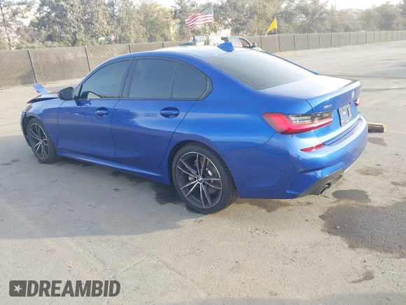 2019 BMW 3 Series 330i xDrive with VIN WBA5R7C50KAE82705, listed as a IAAI auction lot 41233898 with 69,505 mi miles. Bid and sale history available at carsss.com. Image 3.