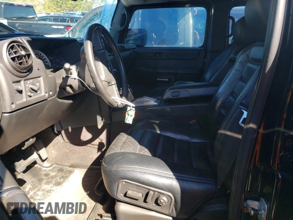2006 Hummer H2 z VIN 5GRGN23U06H104393, wystawiony jako Copart lot #46208975 z przebiegiem 168 053 mil mil oraz Szkoda całkowita • Salvage title. Historia ofert i sprzedaży dostępna na DreamBid. Obrazek 7.