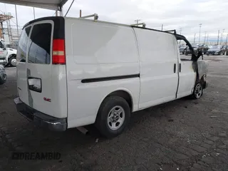 2006 GMC Savana Cargo Van with VIN 1GTFG15X961128838, listed as a IAAI auction lot 41521596 with Not Provided miles. Bid and sale history available at carsss.com. Image 4.
