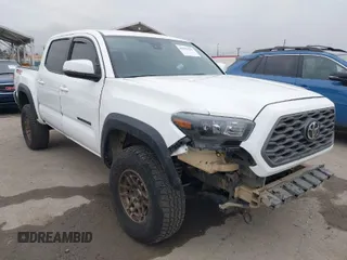 2023 Toyota Tacoma 4WD SR with VIN 3TMCZ5AN0PM534472, listed as a IAAI auction lot 42056291 with 41,910 mi miles. Bid and sale history available at carsss.com. Image 1.