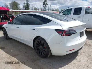 2021 Tesla Model 3 Performance with VIN 5YJ3E1EC2MF096681, listed as a IAAI auction lot 42068782 with 34,852 mi miles and . Bid and sale history available at DreamBid. Image 3.