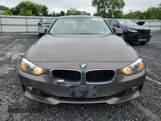 2014 BMW 3 Series 328i with VIN WBA3C1C59EK112967, listed as a Copart auction lot 61473605 with 151,905 mi miles and Clean title. Bid and sale history available at DreamBid. Image 5.