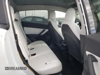 2021 Tesla Model Y Performance with VIN 5YJYGDEF4MF201815, listed as a Copart auction lot 42453075 with 76,888 mi miles and Salvage Title. Bid and sale history available at DreamBid. Image 12.