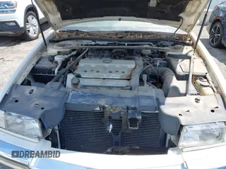 1994 Cadillac Eldorado ESC z VIN 1G6EL12Y4RU604343, wystawiony jako IAAI lot #42221885 z przebiegiem Nie podano mil oraz . Historia ofert i sprzedaży dostępna na DreamBid. Obrazek 10.