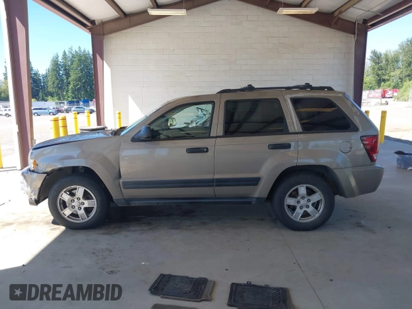 2005 Jeep Grand Cherokee Laredo with VIN 1J4GR48K05C619957, listed as a IAAI auction lot 42626093 with 279,017 mi miles and . Bid and sale history available at DreamBid. Image 14.