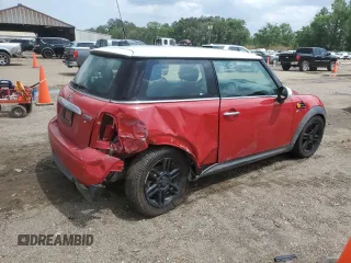 2013 MINI Hardtop with VIN WMWSU3C54DT687765, listed as a Copart auction lot 54677425 with Not Provided miles and Salvage Title. Bid and sale history available at DreamBid. Image 3.
