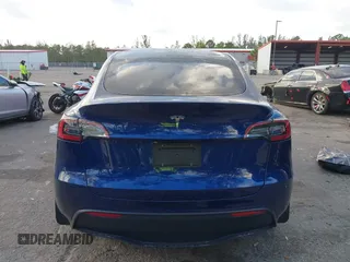 2024 Tesla Model Y с VIN 7SAYGDED5RF015208, выставлен на аукционе IAAI как лот 41608087 с пробегом 10 059 миль миль и . История ставок и продаж доступна на DreamBid. Изображение 16.