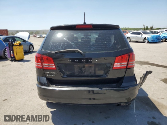 2013 Dodge Journey American Value with VIN 3C4PDCAB6DT709996, listed as a Copart auction lot 52362635 with 104,808 mi miles and Salvage Title. Bid and sale history available at DreamBid. Image 6.