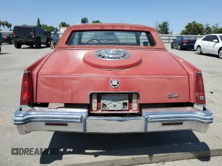 1981 Cadillac Eldorado z VIN 1G6AL5799BE630301, wystawiony jako Copart lot #55995155 z przebiegiem 49 072 mil mil oraz Tytuł czysty. Historia ofert i sprzedaży dostępna na DreamBid. Obrazek 6.