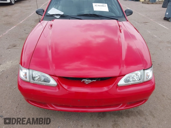 1996 Ford Mustang z VIN 1FALP4045TF183390, wystawiony jako IAAI lot #42361063 z przebiegiem 163 194 mil mil oraz . Historia ofert i sprzedaży dostępna na DreamBid. Obrazek 6.