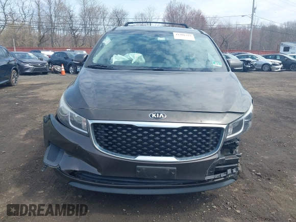2016 Kia Sedona LX with VIN KNDMB5C11G6158934, listed as a IAAI auction lot 41908323 with 105,888 mi miles and . Bid and sale history available at carsss.com. Image 12.