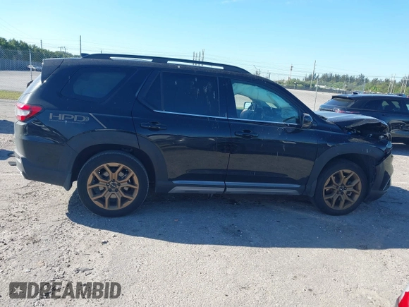 2023 Honda Pilot Elite with VIN 5FNYG1H87PB045057, listed as a IAAI auction lot 41748553 with 44,329 mi miles and . Bid and sale history available at DreamBid. Image 14.