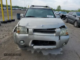 2004 Nissan Frontier LE z VIN 1N6ED27T14C460890, wystawiony jako Copart lot #55610435 z przebiegiem 218 988 mil mil oraz Szkody całkowita. Historia ofert i sprzedaży dostępna na DreamBid. Obrazek 5.