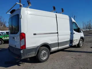 2021 Ford Transit Cargo with VIN 1FTBR1C80MKA48548, listed as a IAAI auction lot 41509103 with 87,523 mi miles and . Bid and sale history available at DreamBid. Image 4.