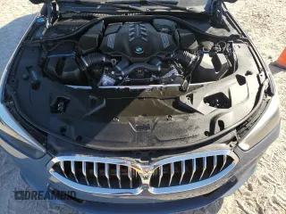 2022 BMW 8 Series M850i с VIN WBAGV8C06NCH25022, выставлен на аукционе Copart как лот 82894104 с пробегом 26 864 миль миль и На запчасти • Non repairable. История ставок и продаж доступна на DreamBid. Изображение 11.
