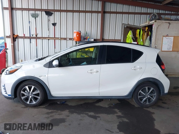 2018 Toyota Prius One with VIN JTDKDTB31J1599993, listed as a IAAI auction lot 42054102 with 107,472 mi miles and . Bid and sale history available at DreamBid. Image 14.