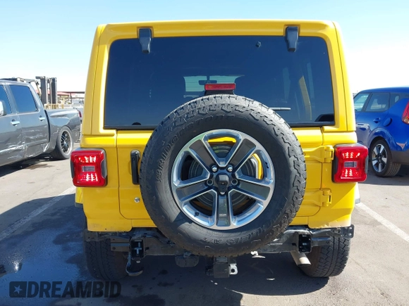 2018 Jeep Wrangler Unlimited Sahara z VIN 1C4HJXEN3JW306282, wystawiony jako IAAI lot #42302821 z przebiegiem 70 204 mil mil oraz . Historia ofert i sprzedaży dostępna na DreamBid. Obrazek 6.