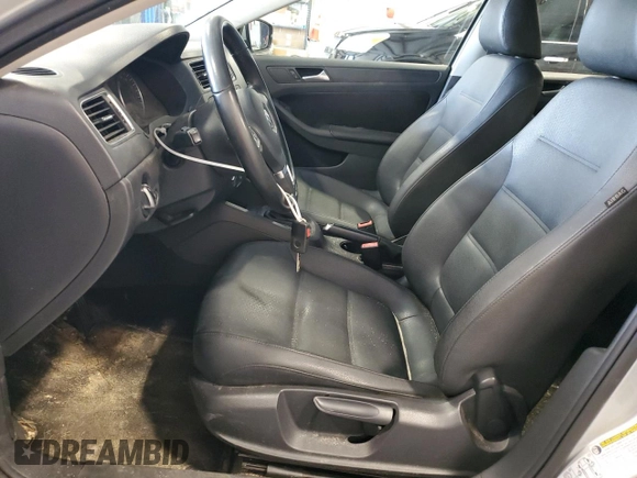 2012 Volkswagen Jetta SE with VIN 3VWDX7AJ1CM389131, listed as a Copart auction lot 64947474 with 140,331 mi miles and Salvage title. Bid and sale history available at DreamBid. Image 7.