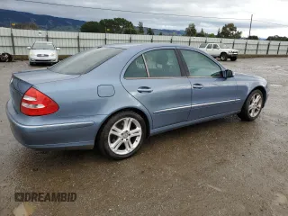 2004 Mercedes-Benz E-Class 5.0L with VIN WDBUF70J94A406133, listed as a Copart auction lot 44396845 with 123,999 mi miles and Salvage Title. Bid and sale history available at carsss.com. Image 3.
