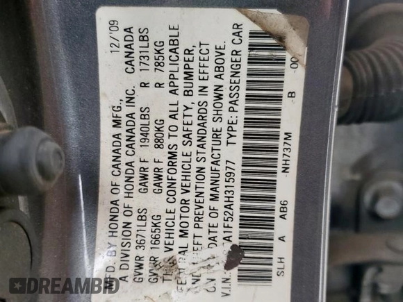2010 Honda Civic LX with VIN 2HGFA1F52AH315977, listed as a Copart auction lot 54240115 with 217,883 mi miles and Salvage Title. Bid and sale history available at DreamBid. Image 12.