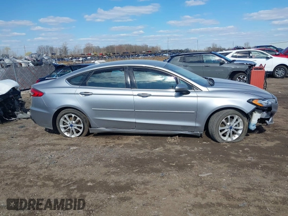 2020 Ford Fusion SE z VIN 3FA6P0LU8LR163896, wystawiony jako IAAI lot #41994803 z przebiegiem 89 892 mil mil oraz . Historia ofert i sprzedaży dostępna na DreamBid. Obrazek 13.