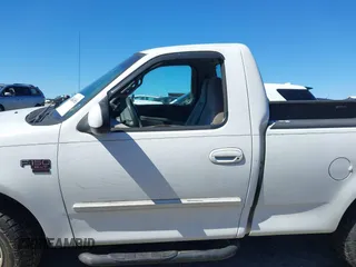 2001 Ford F-150 XL z VIN 1FTRF17W61NB22632, wystawiony jako IAAI lot #41824156 z przebiegiem Nie podano mil oraz . Historia ofert i sprzedaży dostępna na DreamBid. Obrazek 14.