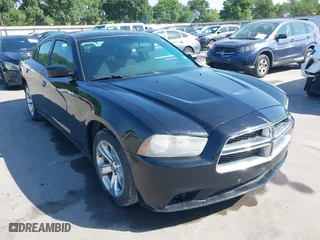 2013 Dodge Charger SE with VIN 2C3CDXBG2DH682471, listed as a IAAI auction lot 41703792 with 230,289 mi miles. Bid and sale history available at carsss.com. Image 1.