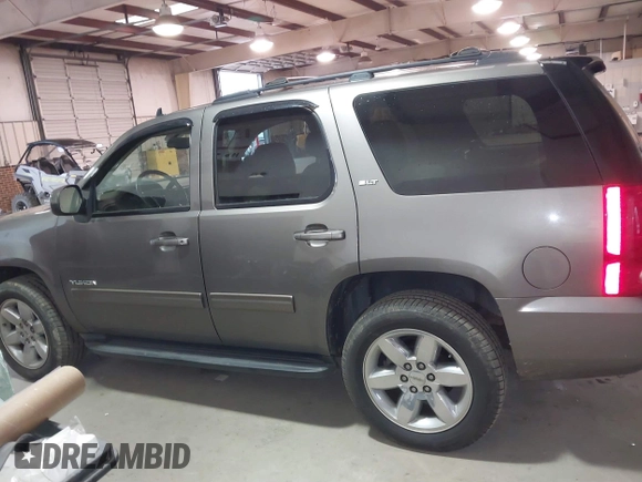 2011 GMC Yukon SLT with VIN 1GKS2CE07BR213141, listed as a IAAI auction lot 41674842 with 226,151 mi miles. Bid and sale history available at carsss.com. Image 14.
