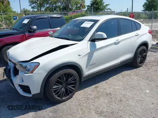 2015 BMW X4 xDrive28i with VIN 5UXXW3C59F0M88331, listed as a IAAI auction lot 42093953 with 138,205 mi miles and . Bid and sale history available at DreamBid. Image 17.
