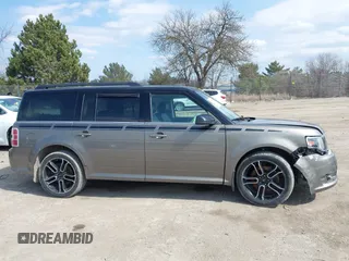 2014 Ford Flex SEL z VIN 2FMGK5C81EBD36460, wystawiony jako IAAI lot #41859985 z przebiegiem 160 572 mil mil oraz . Historia ofert i sprzedaży dostępna na DreamBid. Obrazek 13.