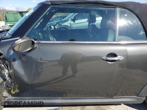 2012 MINI Convertible S with VIN WMWZP3C58CT296381, listed as a Copart auction lot 50834655 with 111,228 mi miles and Salvage Title. Bid and sale history available at DreamBid. Image 7.