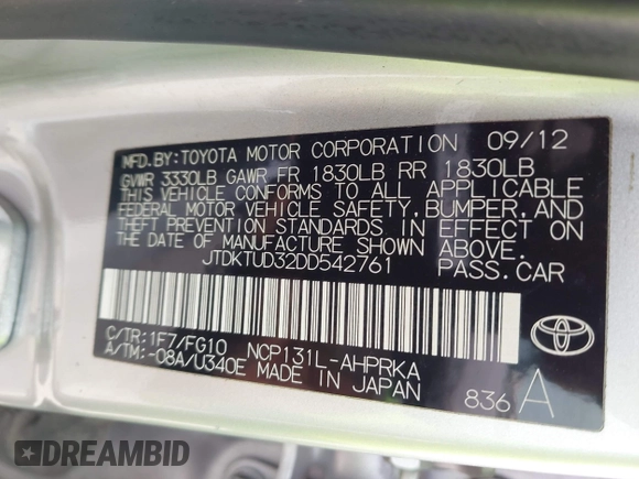 2013 Toyota Yaris L with VIN JTDKTUD32DD542761, listed as a IAAI auction lot 41969533 with 123,281 mi miles. Bid and sale history available at carsss.com. Image 9.